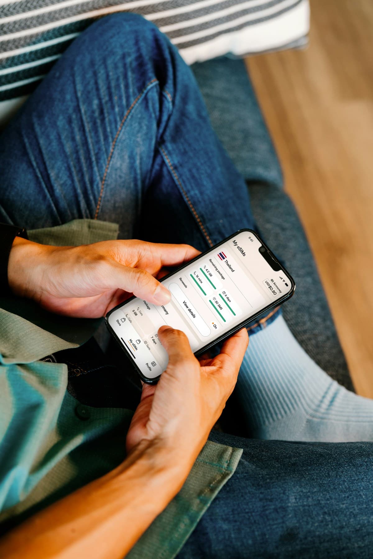 A patient using a smartphone at home